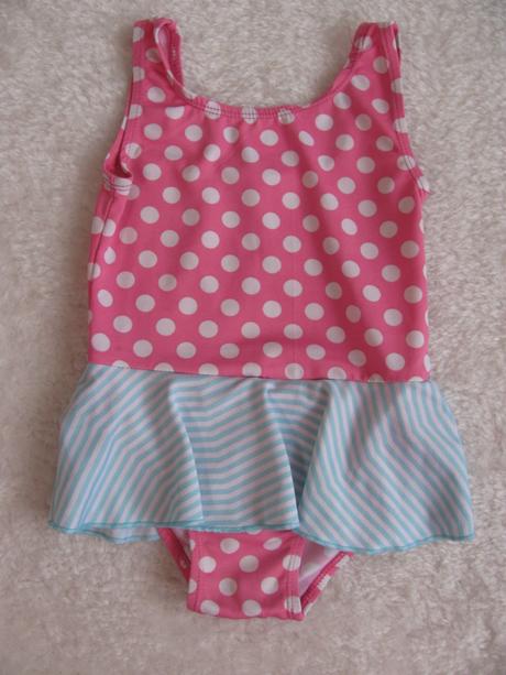 Jednodílné růžové plavky se sukýnkou, 86