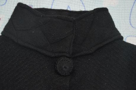 Černý krátký kabátek, 128