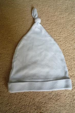 Čepička s uzlem, 62