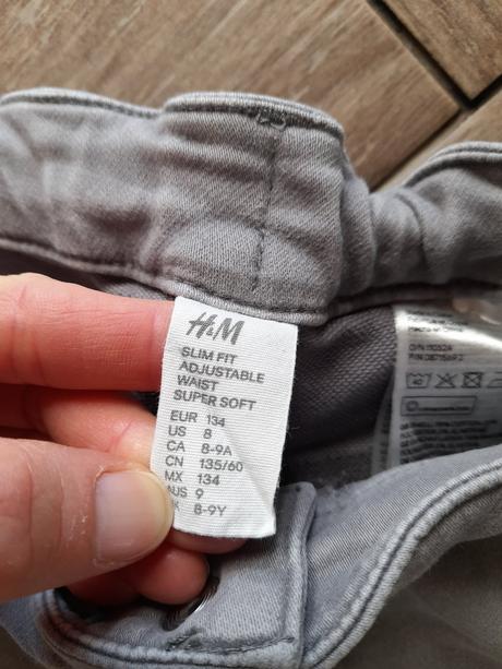 Šedé rifle zn. hm, vel. 134, h&m,134