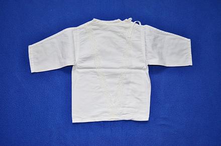 Kojenecká košilka, 62