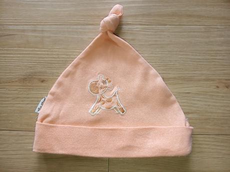 Čepička s žirafou, 62