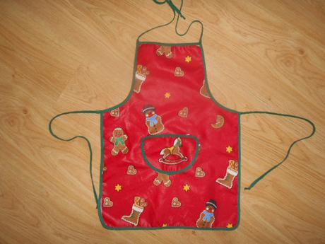 Dívčí zástěra vel.110/116 zn.tcm,