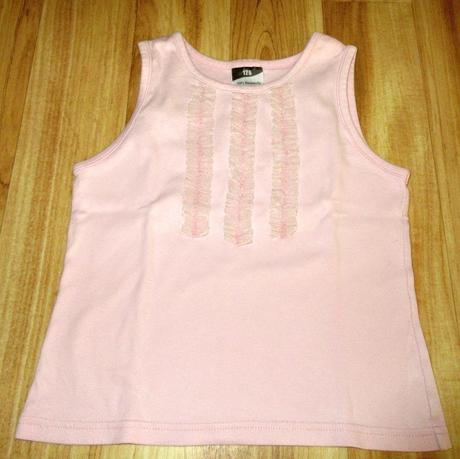 Tílko s třásněmi, 116