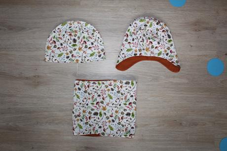 Čepičky a nákrčníky, 56