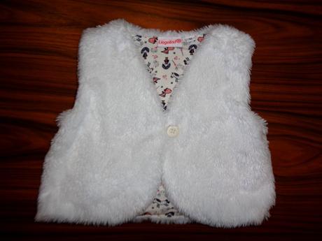 Bílá chlupatková vesta, 92