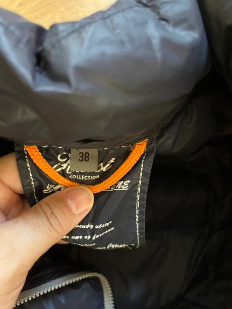 Lehká péřová vesta haust, 38