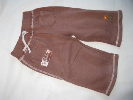 Hnědé tepláčky, 86