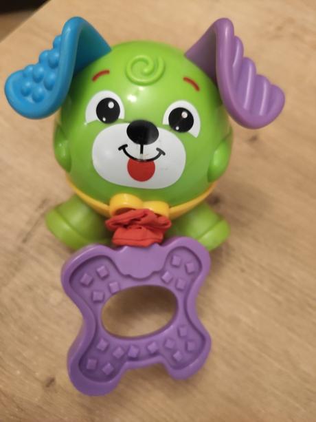Vibrující pejsek značky fisher price, 