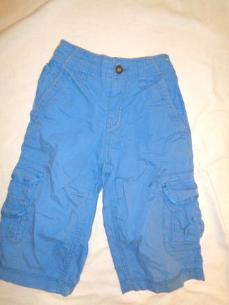 Luxusní modré delší kraťasy - kapsáče, next,128