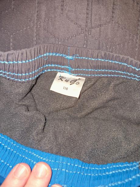 Zimní modré zateplené kalhoty zn. kugo vel. 116, kugo,116