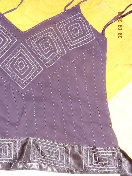 Slavnostní tílko, 158