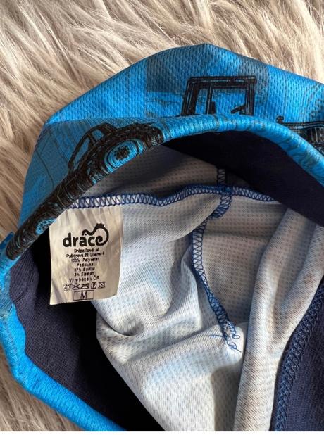 Čepice s traktorem, 146