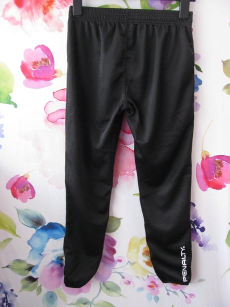 Černé nenošené tréninkové tepláky penalty, 164