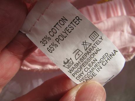 Krásná tylová růžová sukně se zlatou mašlí, 92