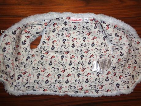 Bílá chlupatková vesta, 92