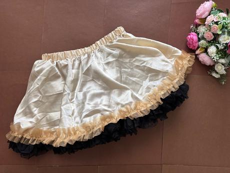 An3/ sukně zlaté šampaňské barvy- v.cca 5/8 let, 122