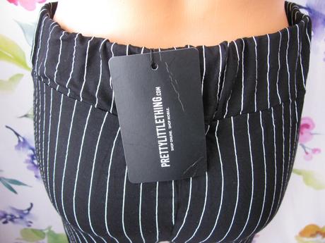 Černé elastické kalhoty s bílými pruhy, 40