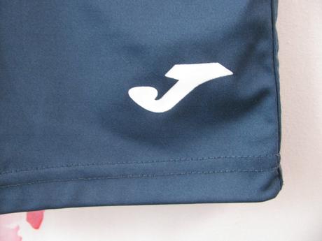 Sportovní modré elastické šortky joma, 140