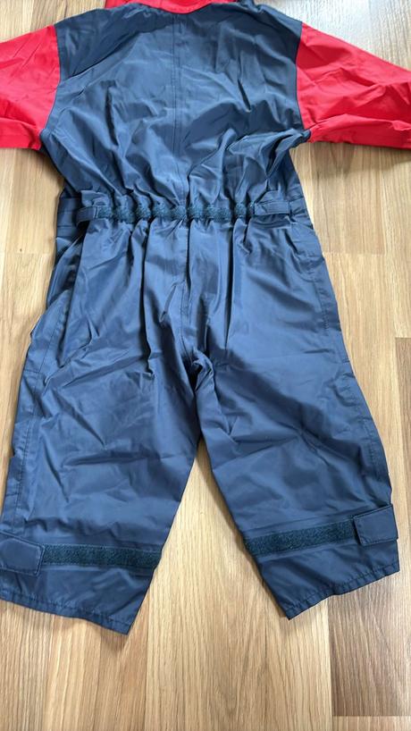 Kombinéza do doště, 92