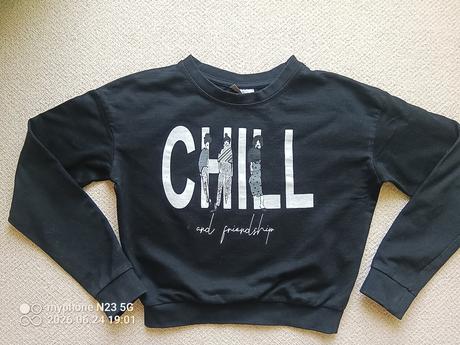 Crop top mikina zn."destination" vel."146-152", 146