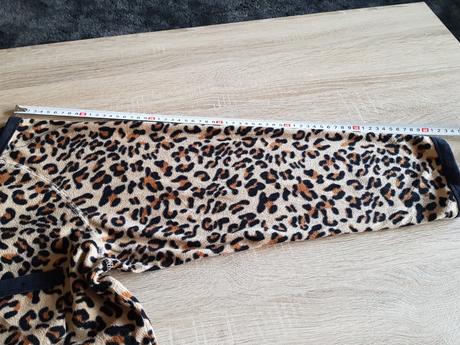 Fleesový overal značky decret, s