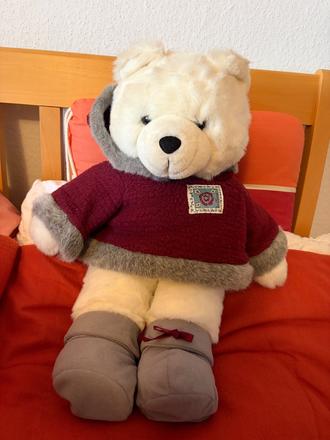 Bily medved plysovy,