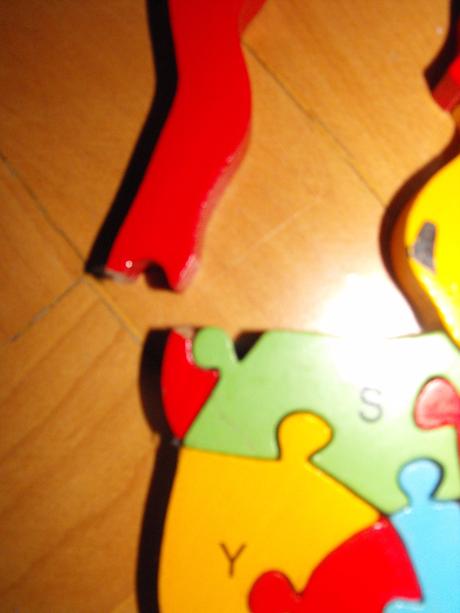 Dřevěný puzzle lev,