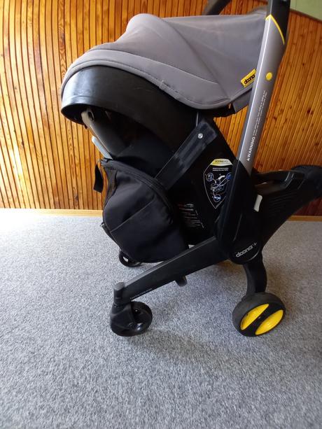 Autosedačka doona s integrovaným podvozkem 2v1, 