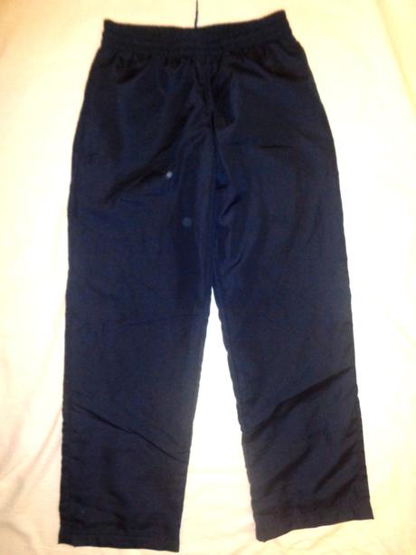 Luxusní tmavomodré sportovní kalhoty, 140