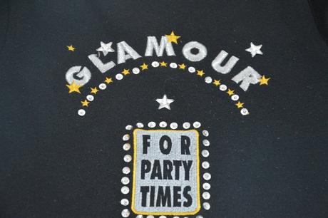 Černá mikina zdobená fllitry, hvězdičkami, 104