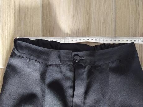 Černé sváteční kalhoty, 152