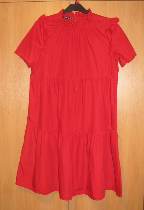 Červené šaty, 44