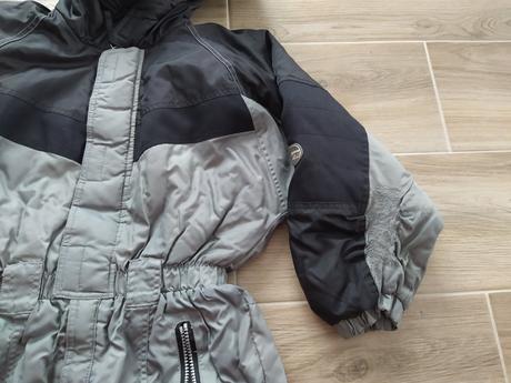 Černá kombinéza, 128