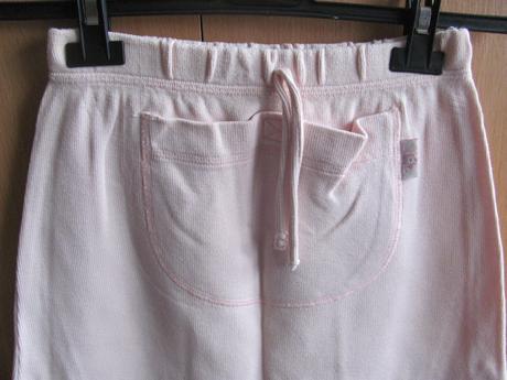 Světle růžová sukně, 122