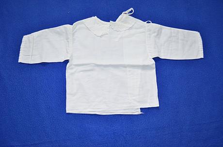 Kojenecká košilka, 56