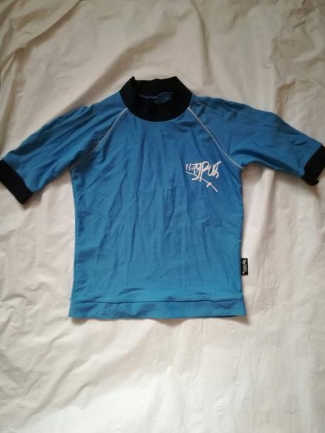 Plavkové tričko, 122