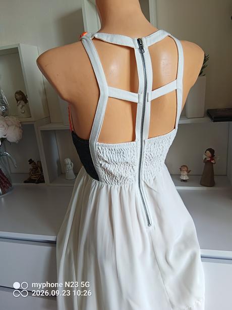 Šaty zn."xenia boutique" vel."8",