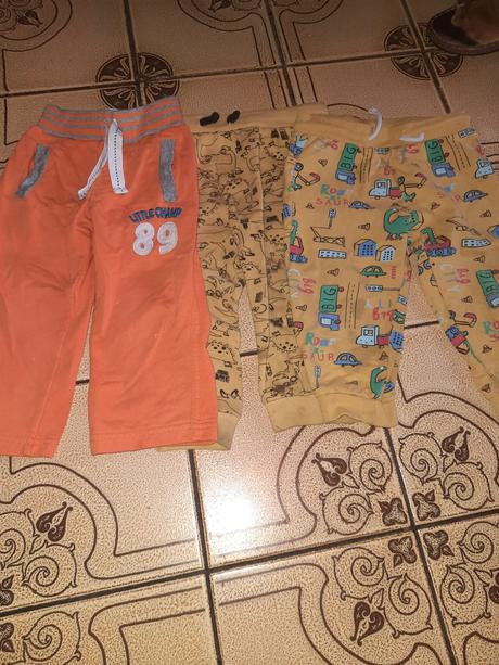 Klučičí tepláky dinosaur, auta, oranžové vel. 80, topomini,80