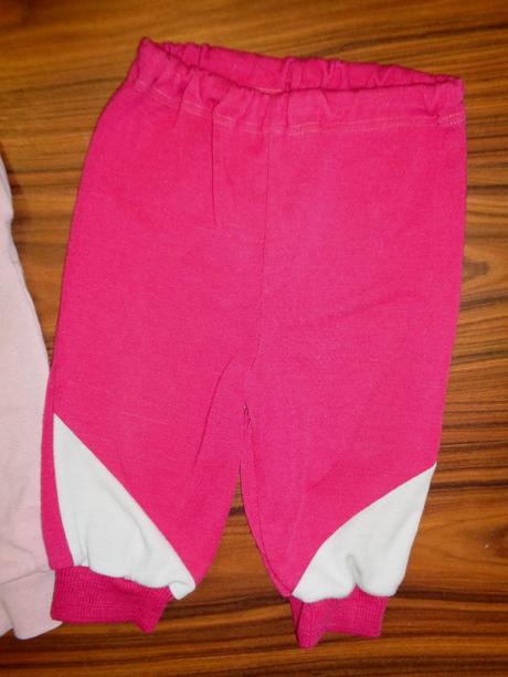 Růžovočervené tepláky, 68