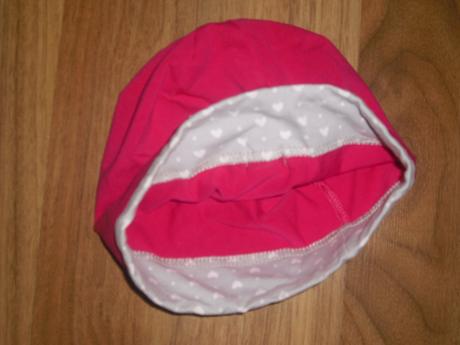 Čepička s mašlí, 104