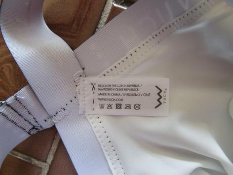 Zajímavé bílé elast. kalhotky s černým lemováním, xs