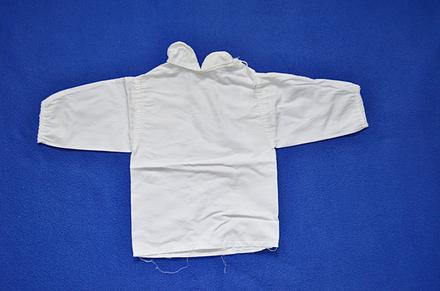 Kojenecká košilka, 62