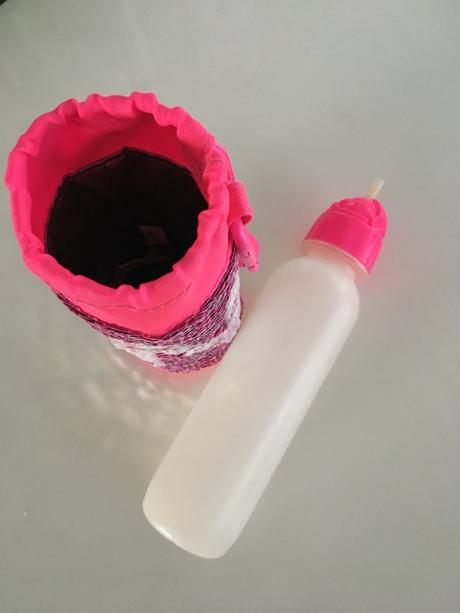 Láhev s obalem justice,