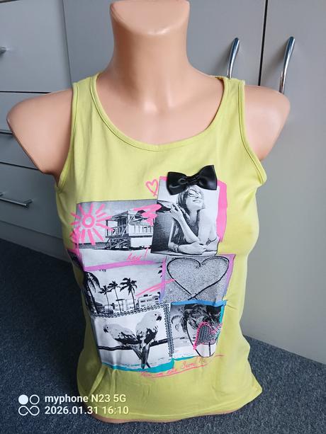 Tílko žluté zn."here+there c&a" vel."146-152", c&a,146