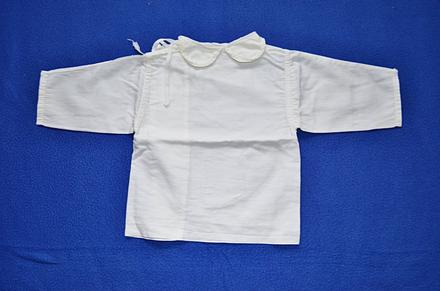 Kojenecká košilka, 62