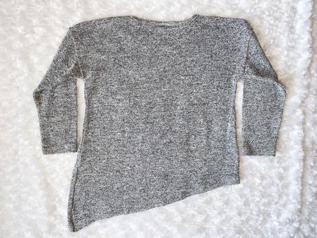 Šedý svetr infinity, 98