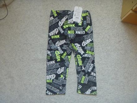 Nové černé 7/8 legíny s nápisy zn. kugo vel. 134, kugo,134