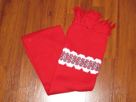 Červená šála, 128