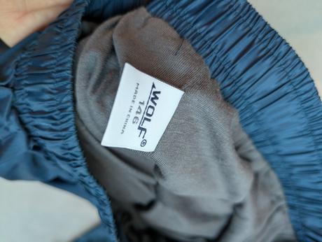 Šusťákové kalhoty, wolf,146